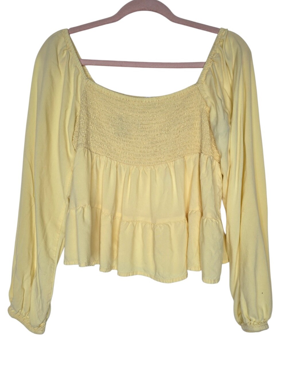 Planet Gold yellow blouse features a smocked bodice and tiered design